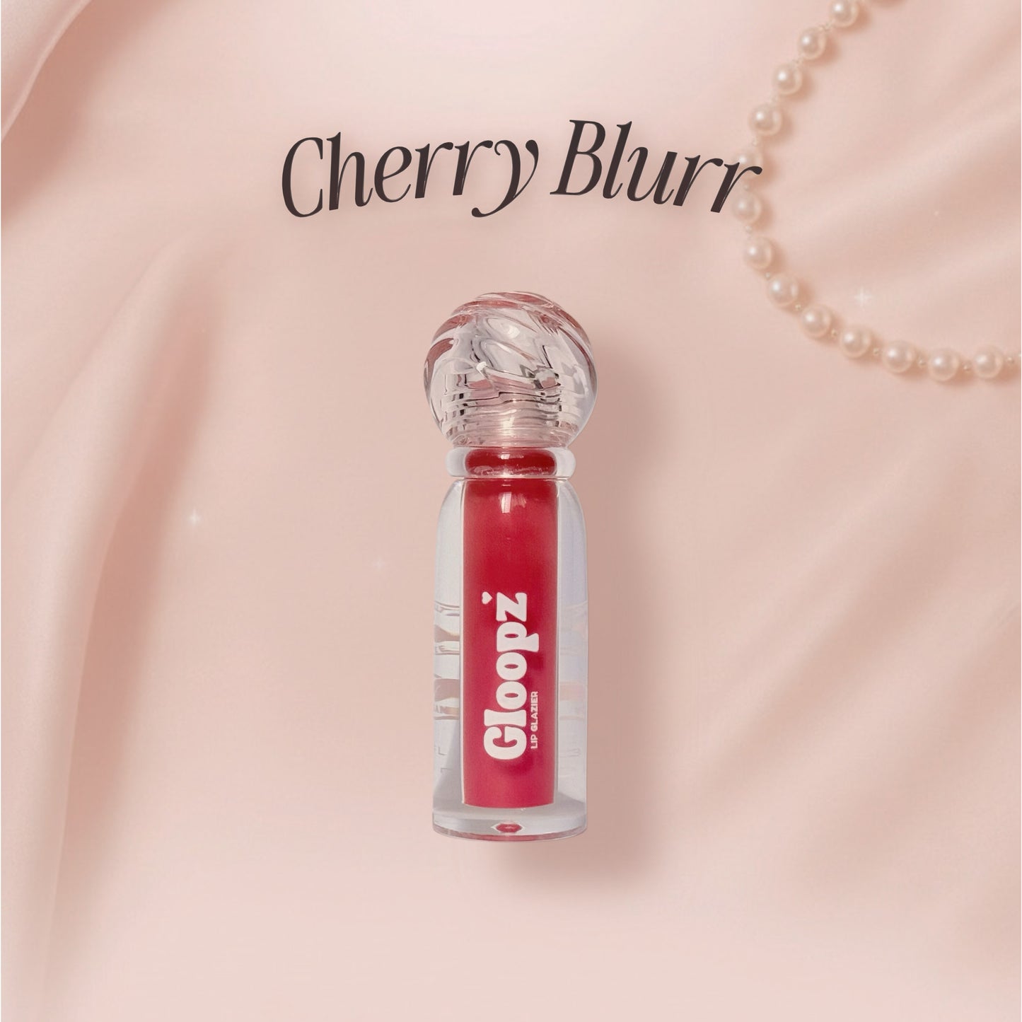 Gloopz Cherry Blurr lip gloss on a pink background with 'Cherry Blurr' text.