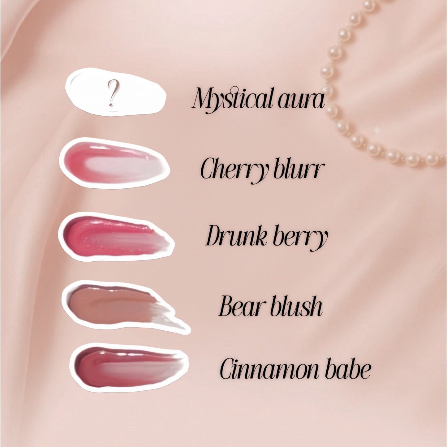 Lipgloss swatches with names on a light rose gold pink background