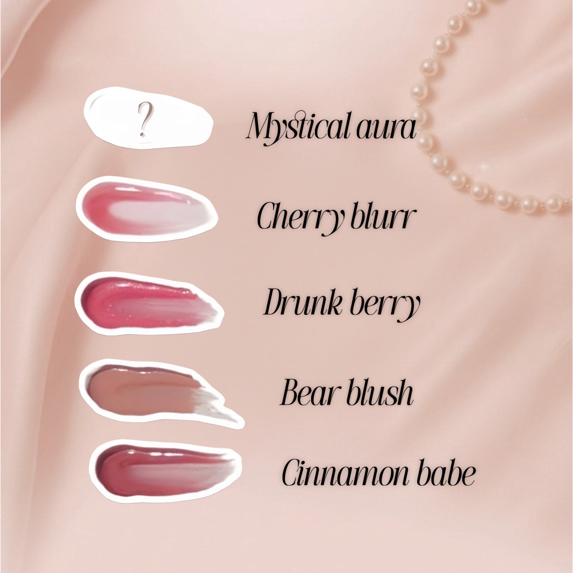 Lipgloss swatches with names on a light rose gold pink background